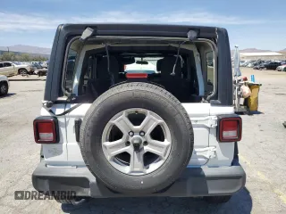 2022 Jeep Wrangler Unlimited Sport S with VIN 1C4HJXDG0NW142272, listed as a Copart auction lot 58198205 with 63,310 mi miles and Salvage title. Bid and sale history available at DreamBid. Image 6.