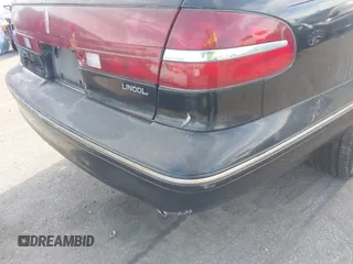 1997 Lincoln Continental with VIN 1LNLM97V5VY665410, listed as a IAAI auction lot 41239128 with 66,873 mi miles. Bid and sale history available at carsss.com. Image 17.