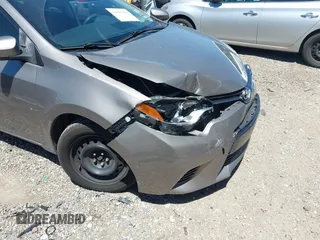 2015 Toyota Corolla L with VIN 5YFBURHE1FP312604, listed as a IAAI auction lot 42085424 with 123,379 mi miles and . Bid and sale history available at DreamBid. Image 17.