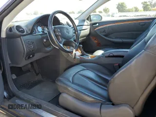 2003 Mercedes-Benz CLK 500 with VIN WDBTJ75J43F018571, listed as a Copart auction lot 72736304 with 125,780 mi miles and Salvage Title. Bid and sale history available at DreamBid. Image 7.
