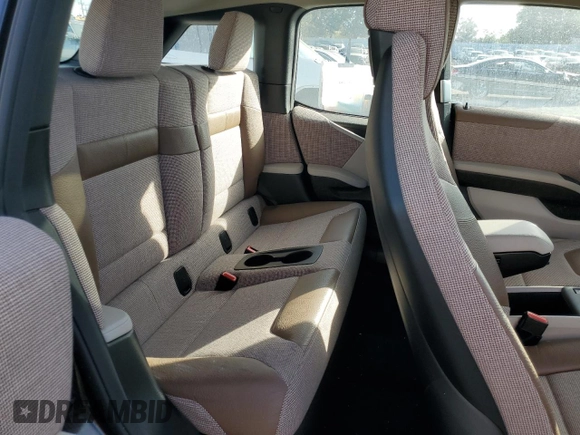 2019 BMW i3 z VIN WBY8P4C54K7D28773, wystawiony jako Copart lot #42563815 z przebiegiem 34 850 mil mil oraz Szkoda całkowita • Salvage title. Historia ofert i sprzedaży dostępna na DreamBid. Obrazek 10.