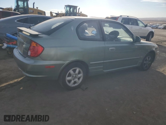 2003 Hyundai Accent GL with VIN KMHCG35CX3U242848, listed as a Copart auction lot 86558394 with 56,248 mi miles and Salvage Title. Bid and sale history available at carsss.com. Image 3.