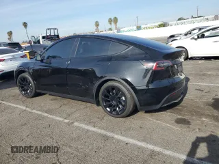 2024 Tesla Model Y Long Range with VIN 7SAYGDEE5RF060707, listed as a Copart auction lot 87288784 with Not provided miles and Salvage title. Bid and sale history available at DreamBid. Image 2.
