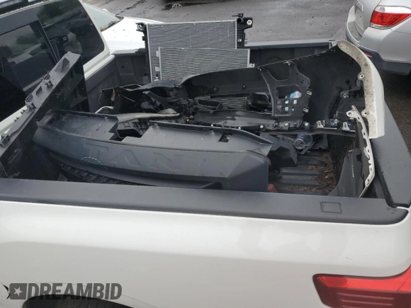 2021 Nissan Titan S with VIN 1N6AA1EC9MN529818, listed as a Copart auction lot 47041365 with 70,273 mi miles and Salvage title. Bid and sale history available at DreamBid. Image 12.