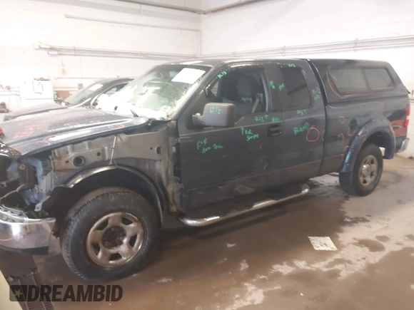 2005 Ford F-150 XLT with VIN 1FTPX14555NA01757, listed as a IAAI auction lot 41935980 with 145,311 mi miles. Bid and sale history available at carsss.com. Image 2.