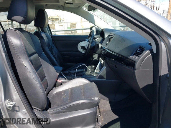 2014 Mazda CX-5 Grand Touring with VIN JM3KE2DY0E0331942, listed as a IAAI auction lot 41750533 with 163,387 mi miles. Bid and sale history available at carsss.com. Image 5.