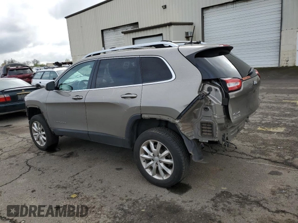 2017 Jeep Cherokee Limited with VIN 1C4PJMDSXHW633757, listed as a Copart auction lot 52146435 with 104,066 mi miles and Salvage Title. Bid and sale history available at DreamBid. Image 2.