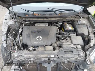 2016 Mazda CX-5 Touring with VIN JM3KE4CY5G0695242, listed as a IAAI auction lot 41795135 with 195,162 mi miles. Bid and sale history available at carsss.com. Image 10.