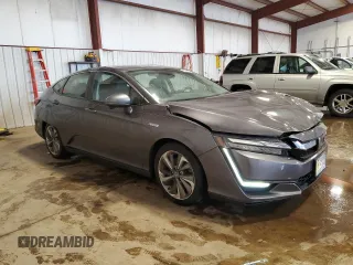 2018 Honda Clarity z VIN JHMZC5F16JC013751, wystawiony jako Copart lot #56651145 z przebiegiem 61 385 mil mil oraz Szkoda całkowita • Salvage title. Historia ofert i sprzedaży dostępna na DreamBid. Obrazek 4.