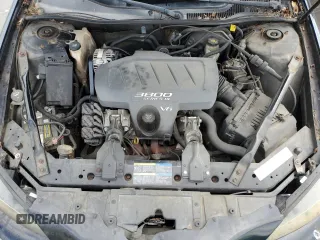 2005 Pontiac Grand Prix z VIN 2G2WS542651161577, wystawiony jako Copart lot #56522945 z przebiegiem 241 430 mil mil oraz Szkody całkowita. Historia ofert i sprzedaży dostępna na DreamBid. Obrazek 11.