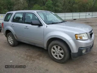 2011 Mazda Tribute Touring with VIN 4F2CY0C70BKM06723, listed as a Copart auction lot 80783624 with 218,372 mi miles and Salvage Title. Bid and sale history available at carsss.com. Image 4.