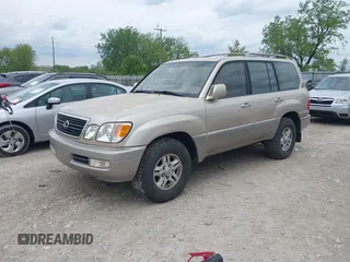 1999 Lexus LX 470 with VIN JT6HT00W6X0041264, listed as a IAAI auction lot 42177546 with 272,000 mi miles and . Bid and sale history available at DreamBid. Image 2.