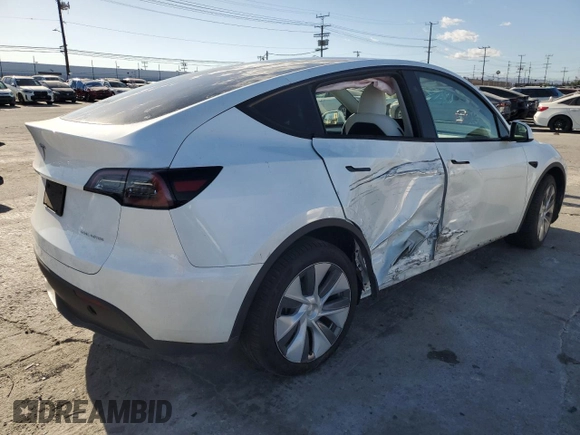 2024 Tesla Model Y Long Range with VIN 7SAYGDEE6RA261884, listed as a Copart auction lot 47639025 with 23,377 mi miles and Salvage Title. Bid and sale history available at DreamBid. Image 3.