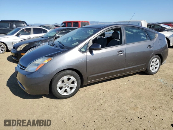 2007 Toyota Prius z VIN JTDKB20U573288978, wystawiony jako Copart lot #57469155 z przebiegiem 170 422 mil mil oraz Szkoda całkowita • Salvage title. Historia ofert i sprzedaży dostępna na DreamBid. Obrazek 1.