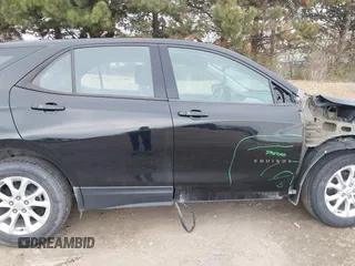 2018 Chevrolet Equinox LS z VIN 2GNAXREV3J6258814, wystawiony jako IAAI lot #41907865 z przebiegiem 148 270 mil mil oraz . Historia ofert i sprzedaży dostępna na DreamBid. Obrazek 14.