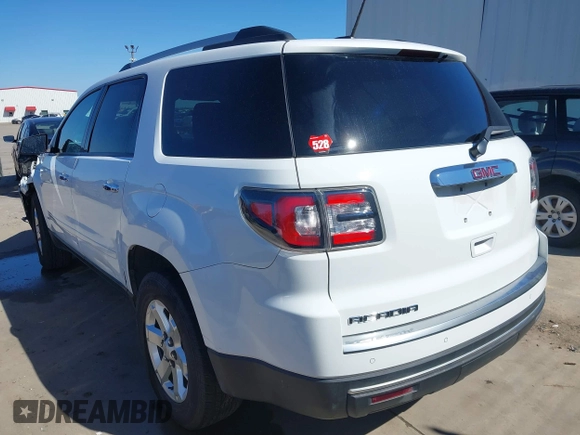 2016 GMC Acadia SLE with VIN 1GKKRNED8GJ205999, listed as a IAAI auction lot 41648295 with 68,906 mi miles and . Bid and sale history available at DreamBid. Image 3.
