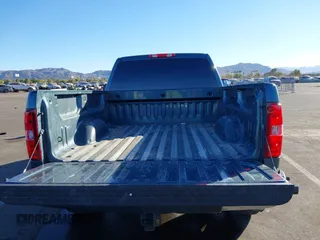 2009 Chevrolet Silverado 1500 with VIN 1GCEC24039Z215240, listed as a IAAI auction lot 41308199 with 104,662 mi miles and . Bid and sale history available at DreamBid. Image 8.