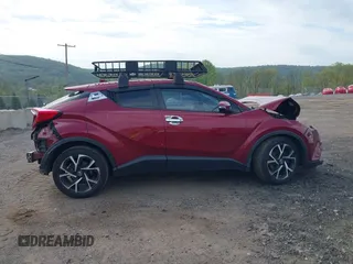 2018 Toyota C-HR XLE with VIN NMTKHMBX7JR010783, listed as a IAAI auction lot 42173610 with 93,320 mi miles and . Bid and sale history available at DreamBid. Image 14.