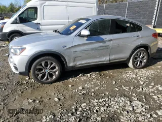 2017 BMW X4 xDrive28i with VIN 5UXXW3C52H0T77719, listed as a Copart auction lot 52393155 with 184,664 mi miles and Salvage title. Bid and sale history available at DreamBid. Image 1.