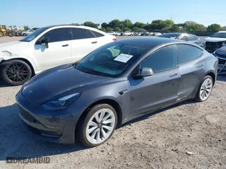 2023 Tesla Model 3 with VIN 5YJ3E1EA2PF642253, listed as a IAAI auction lot 41777160 with 29,817 mi miles. Bid and sale history available at carsss.com. Image 2.