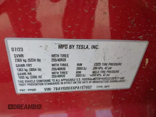 2023 Tesla Model Y Long Range with VIN 7SAYGDEE6PA157652, listed as a IAAI auction lot 41866777 with 22,584 mi miles. Bid and sale history available at carsss.com. Image 9.