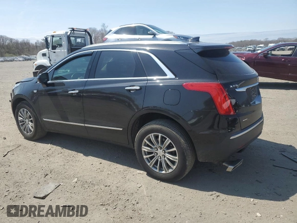 2018 Cadillac XT5 Luxury AWD with VIN 1GYKNDRS5JZ210221, listed as a Copart auction lot 52502595 with 68,579 mi miles and Salvage Title. Bid and sale history available at DreamBid. Image 2.
