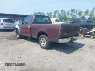2000 Ford F-150 XL with VIN 1FTZF1721YNB05244, listed as a IAAI auction lot 42298391 with Not provided miles and . Bid and sale history available at DreamBid. Image 3.