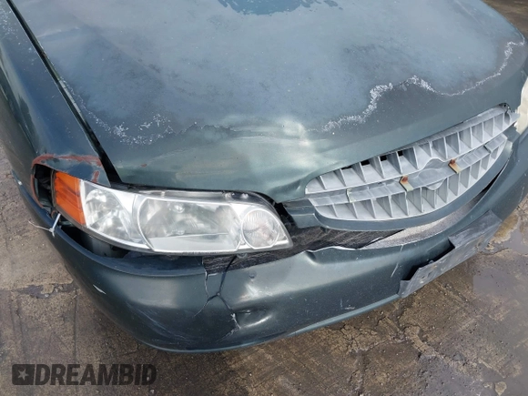 2000 Nissan Altima XE with VIN 1N4DL01D4YC102704, listed as a IAAI auction lot 41538425 with 228,639 mi miles and . Bid and sale history available at DreamBid. Image 6.