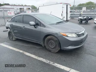 2012 Honda Civic LX with VIN 2HGFB2F58CH593658, listed as a IAAI auction lot 41965400 with 172,340 mi miles and . Bid and sale history available at DreamBid. Image 1.