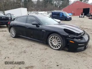 2015 Porsche Panamera 4 z VIN WP0AA2A76FL001864, wystawiony jako Copart lot #40833453 z przebiegiem 71 740 mil mil oraz . Historia ofert i sprzedaży dostępna na DreamBid. Obrazek 4.