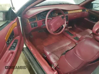 1992 Cadillac Eldorado z VIN 1G6EL13B8NU614555, wystawiony jako Copart lot #73767514 z przebiegiem 88 448 mil mil oraz Tytuł czysty. Historia ofert i sprzedaży dostępna na DreamBid. Obrazek 8.