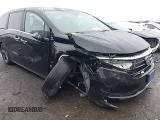 2021 Honda Odyssey EX with VIN 5FNRL6H53MB010305, listed as a IAAI auction lot 41028592 with 39,368 mi miles and . Bid and sale history available at DreamBid. Image 6.