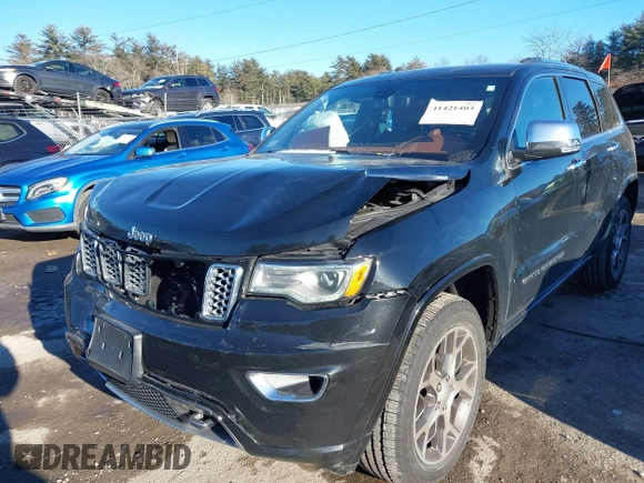 2021 Jeep Grand Cherokee Overland with VIN 1C4RJFCG3MC601150, listed as a IAAI auction lot 41421403 with 165,614 mi miles and . Bid and sale history available at DreamBid. Image 6.