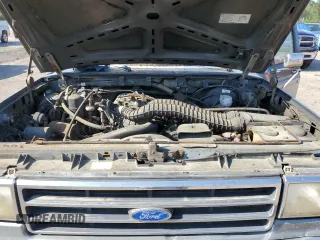 1990 Ford F-150 with VIN 1FTEX15NXLKA72702, listed as a Copart auction lot 52421535 with 720,181 mi miles and Clean Title. Bid and sale history available at carsss.com. Image 11.