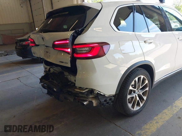 2022 BMW X5 xDrive40i with VIN 5UXCR6C09N9M21945, listed as a IAAI auction lot 42170363 with 23,537 mi miles and . Bid and sale history available at DreamBid. Image 22.