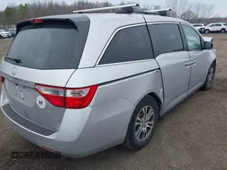 2013 Honda Odyssey EX-L with VIN 5FNRL5H65DB050789, listed as a IAAI auction lot 41911537 with 160,348 mi miles and . Bid and sale history available at carsss.com. Image 17.