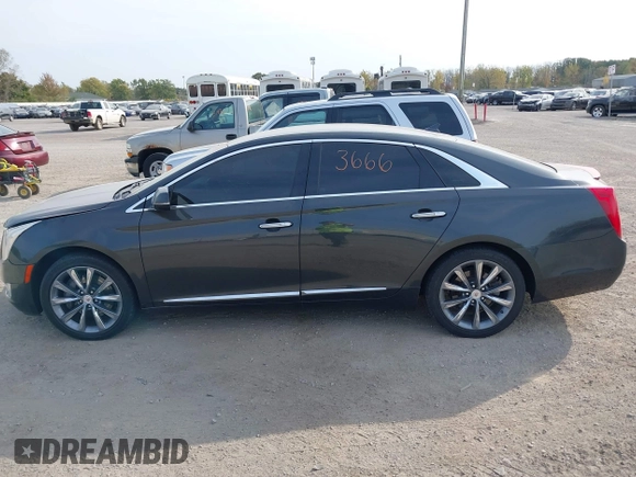 2013 Cadillac XTS Luxury with VIN 2G61P5S3XD9228218, listed as a IAAI auction lot 40503666 with 87,857 mi miles. Bid and sale history available at carsss.com. Image 14.