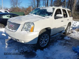 2014 GMC Yukon Denali with VIN 1GKS2EEF3ER181504, listed as a IAAI auction lot 41267224 with 165,478 mi miles. Bid and sale history available at carsss.com. Image 16.