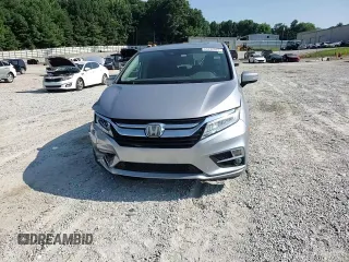 2018 Honda Odyssey Elite with VIN 5FNRL6H95JB062033, listed as a Copart auction lot 63732915 with 105,234 mi miles and Salvage title. Bid and sale history available at DreamBid. Image 14.