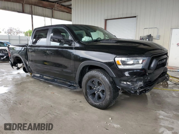 2020 Ram 1500 Rebel with VIN 1C6SRFLT8LN174114, listed as a Copart auction lot 59323525 with 102,701 mi miles and Non repairable. Bid and sale history available at DreamBid. Image 4.