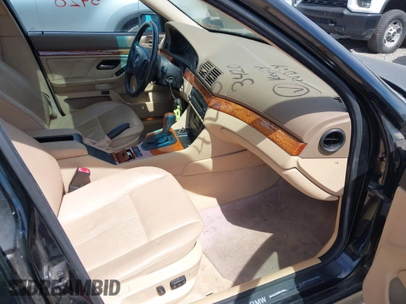 1999 BMW 5 Series 528iA with VIN WBADM6331XBY29010, listed as a IAAI auction lot 42103420 with 196,575 mi miles. Bid and sale history available at carsss.com. Image 5.