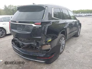 2022 Cadillac XT6 Premium Luxury with VIN 1GYKPDRS5NZ149971, listed as a IAAI auction lot 42259140 with 51,704 mi miles and . Bid and sale history available at DreamBid. Image 4.