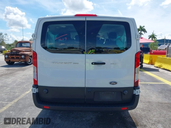 2020 Ford Transit Passenger XL with VIN 1FBAX2Y80LKA42137, listed as a IAAI auction lot 42802902 with 59,540 mi miles and . Bid and sale history available at DreamBid. Image 17.