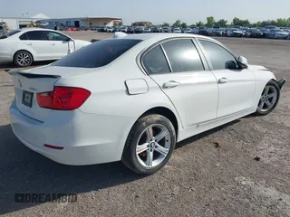 2014 BMW 3 Series 328i with VIN WBA3A5G5XENP32345, listed as a IAAI auction lot 42303835 with 100,235 mi miles and . Bid and sale history available at DreamBid. Image 4.