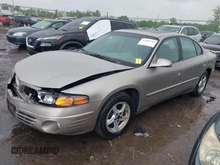 2001 Pontiac Bonneville SE z VIN 1G2HX54K814258899, wystawiony jako IAAI lot #42260783 z przebiegiem 165 869 mil mil oraz . Historia ofert i sprzedaży dostępna na DreamBid. Obrazek 17.