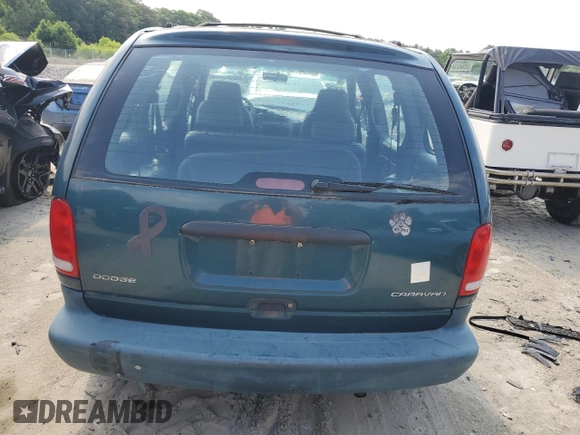 2000 Dodge Caravan with VIN 2B4GP25R1YR774687, listed as a Copart auction lot 58739054 with 65,068 mi miles and Salvage Title. Bid and sale history available at carsss.com. Image 6.