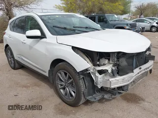 2021 Acura RDX w/Technology Package with VIN 5J8TC1H51ML022573, listed as a IAAI auction lot 41893265 with 56,516 mi miles. Bid and sale history available at carsss.com. Image 1.