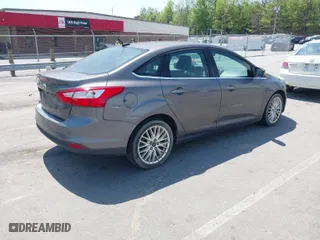 2012 Ford Focus SEL with VIN 1FAHP3H28CL282080, listed as a IAAI auction lot 42039926 with 134,785 mi miles. Bid and sale history available at carsss.com. Image 4.