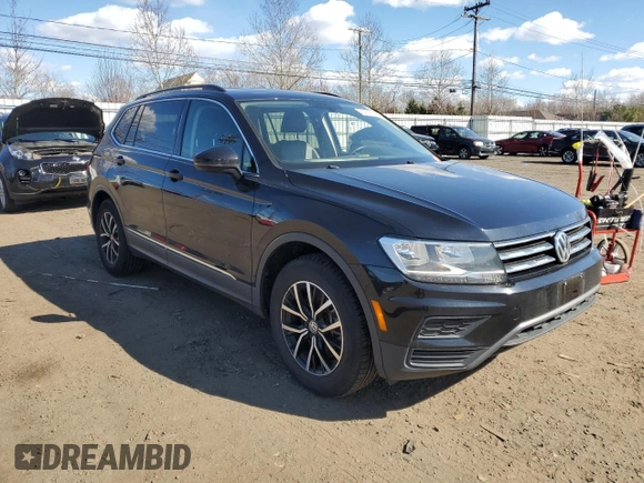 2021 Volkswagen Tiguan SE with VIN 3VV3B7AX3MM042775, listed as a Copart auction lot 50608595 with 89,480 mi miles and Salvage Title. Bid and sale history available at DreamBid. Image 4.