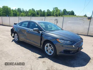 2018 Ford Fusion SE z VIN 3FA6P0H71JR155221, wystawiony jako IAAI lot #42145081 z przebiegiem 189 367 mil mil oraz . Historia ofert i sprzedaży dostępna na DreamBid. Obrazek 1.